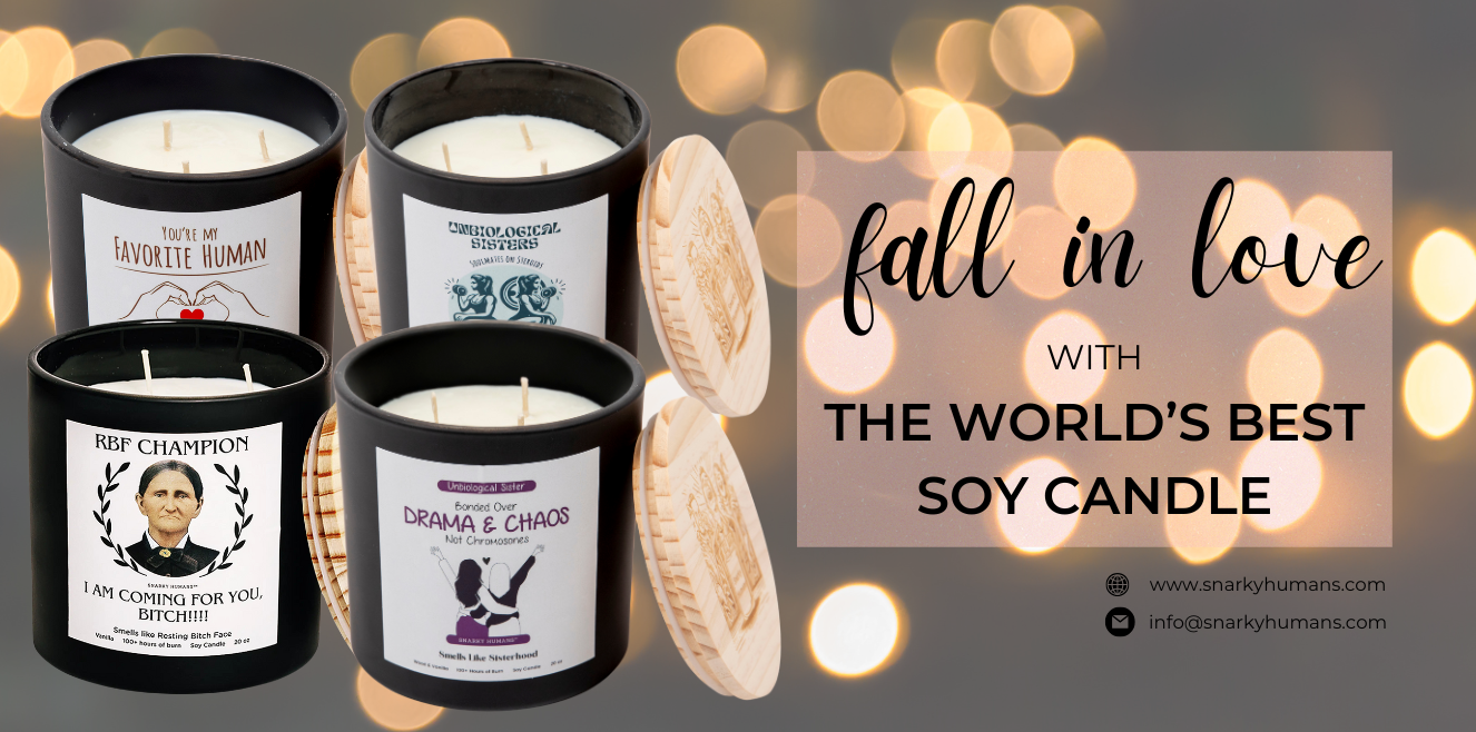 Four decorative soy candles with playful labels