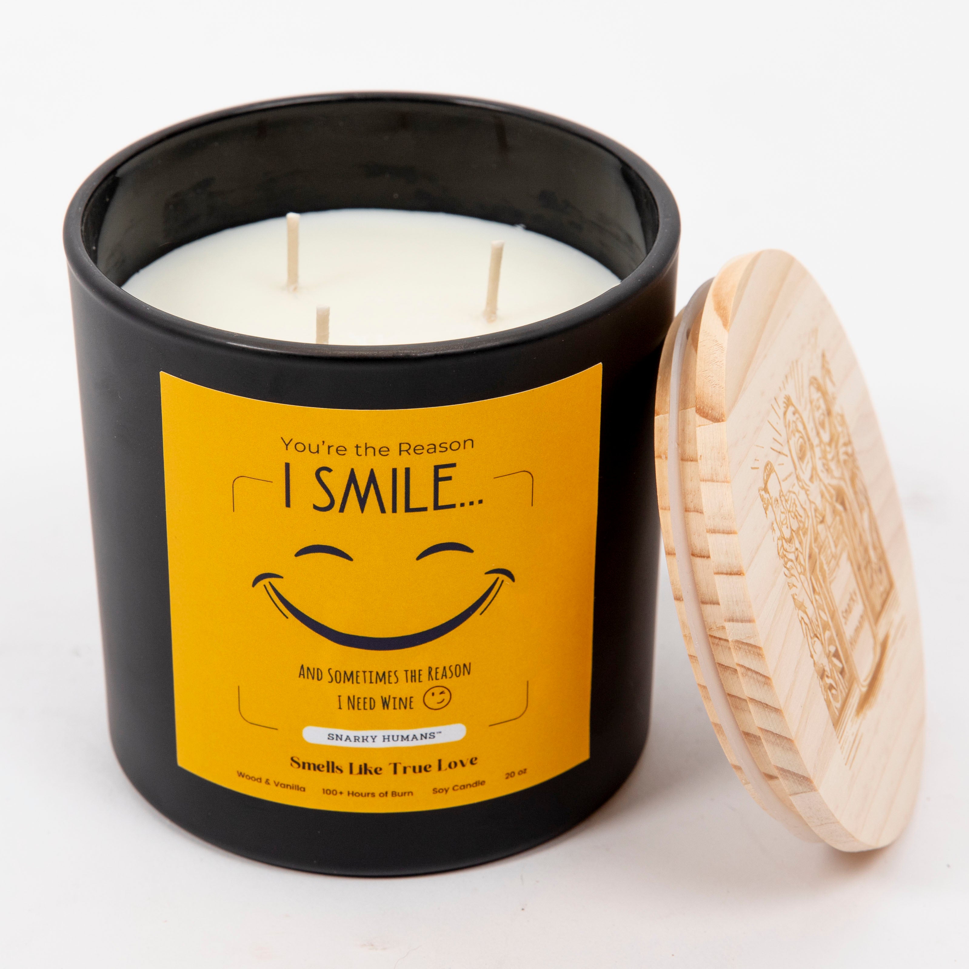 A black soy candle with a cheerful yellow label